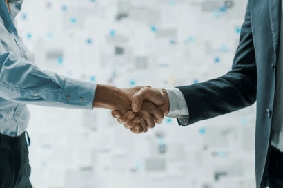 photo of new partners shaking hands